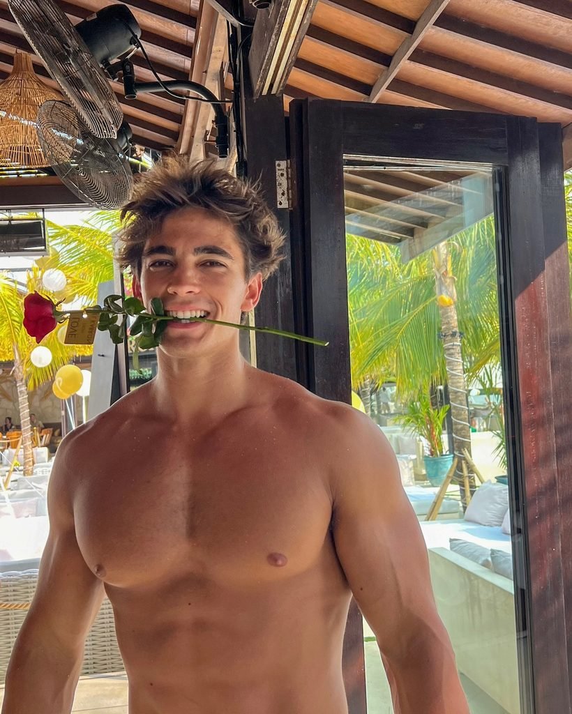 Kyle Kuznik shirtless travel photo from his feed