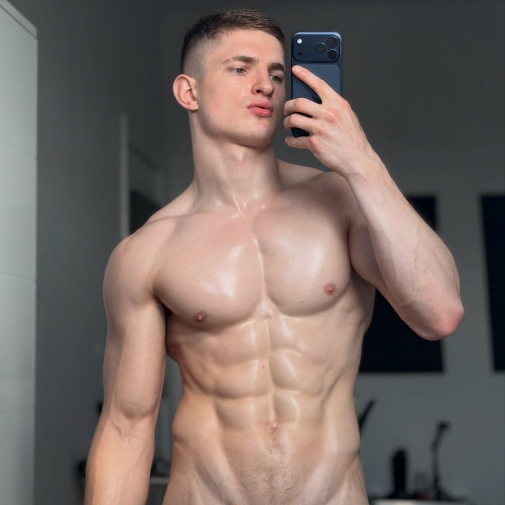 Oleg Ravv, fitness model and former wrestler, looking at the camera